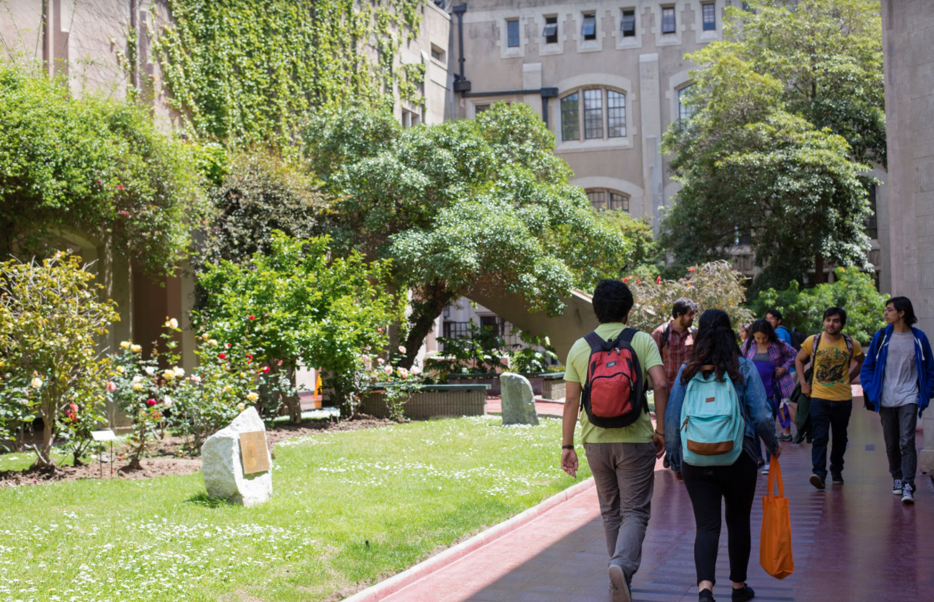 Students walking through the campus of the Technical University Federico Santa María